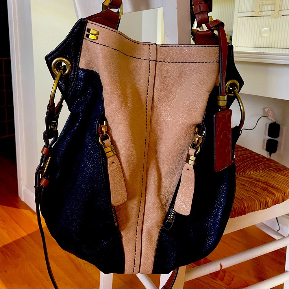 OrYani Hobo-navy, cream, and tan with gold hardware, zippers, green lining